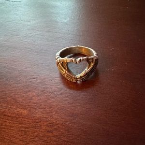 .925 sterling silver skeleton heart hands ring.
